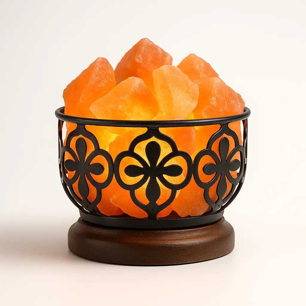 Basket-style Himalayan salt lamp with glowing salt chunks in a decorative black metal basket on a wooden base, white background.